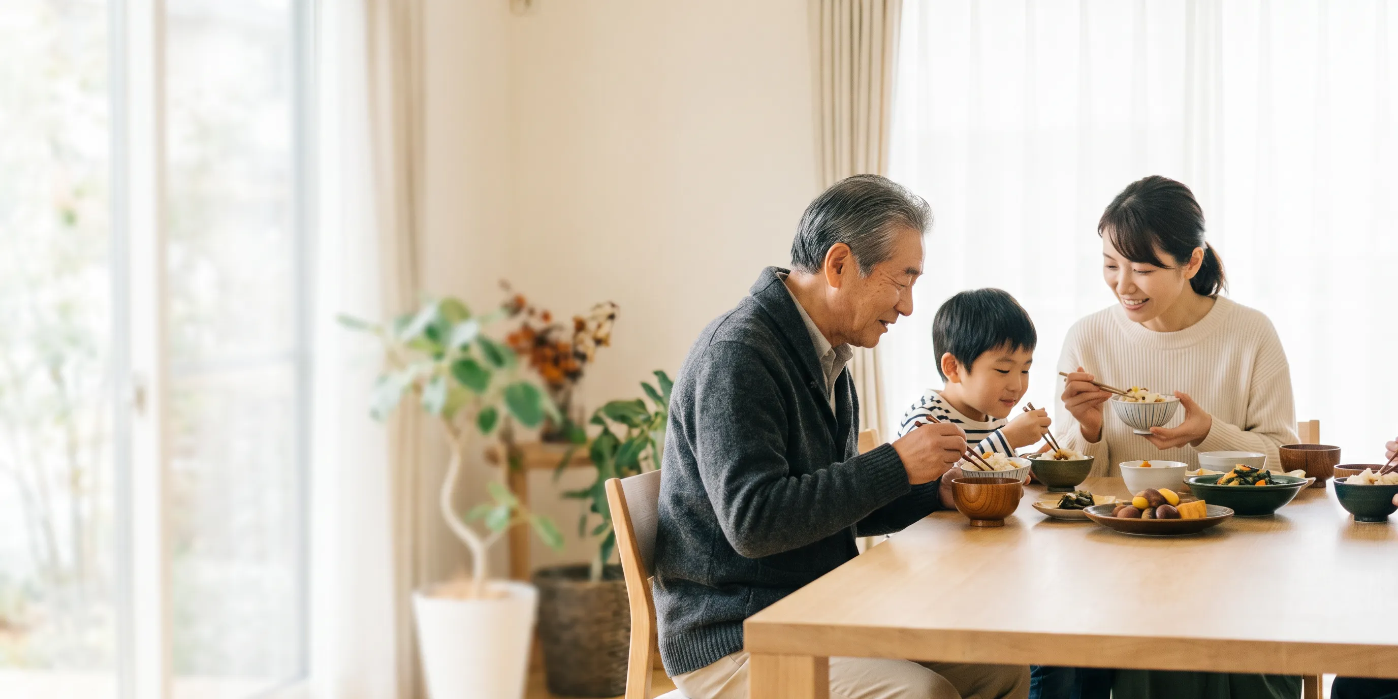 秋の食卓を囲む三世代の家族